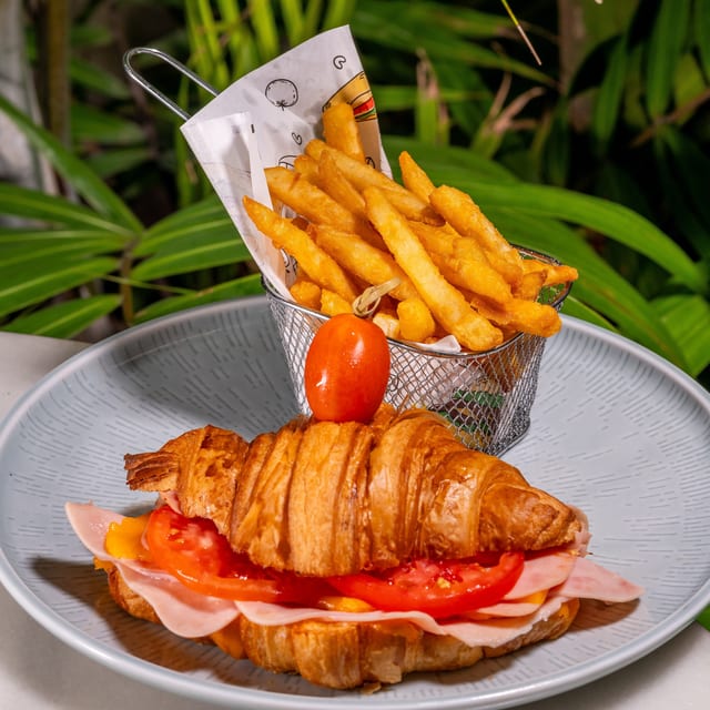 Messy Ham Croissant Sandwich.